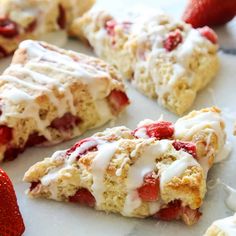 strawberry scones with icing and strawberries on top