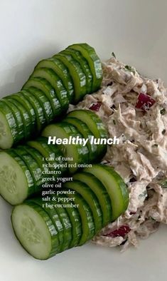 cucumber slices with tuna salad in the middle