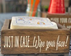 a wooden box with writing on it that says just in case we're your face