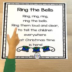 a hand pointing at a bell with the words ring the bells on it and an image of