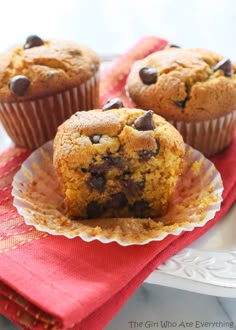 three chocolate chip muffins on a plate