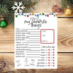 a printable list for the holidays with christmas decorations and ornaments around it on a wooden table