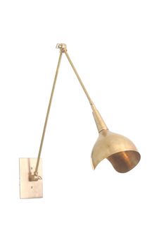 a wall light that is on the side of a white wall with a metal pole attached to it