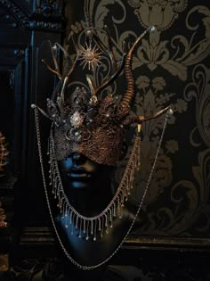 This absolute show stopper of a mask is a bold statement.  With detachable chains and beautiful pearl finishes this mask is blind illusion so can still be seen through. Ready made and can ship in 1-3 business days. Evil Masquerade Mask, Soothsayer Costume, Human Muzzle Mask, Naga Poses, Gangsta Mask, Dark Fire Aesthetic, Cool Masks Designs Ideas, Masquerade Headpiece, Fantasy Mask Design