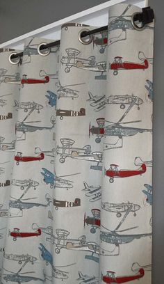 a curtain with airplanes printed on it