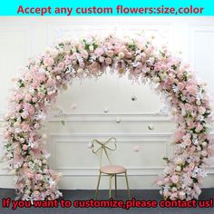 a chair sitting under a flower covered arch with pink flowers on it and the words accept any custom floral size color if you want to customize please contact us