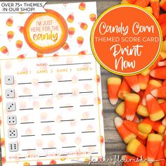 candy corn themed score card next to dices