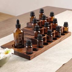 Essential oil bottle storage display rack Simple and Retro Style Whole teakwood, smooth without burrs Made through multiple processes, hand polished, finely crafted, safe to touch the box surface, smooth and delicate, without any roughness ⭐Note: Each slot has a small hole ⭐Material: - Teakwood ⭐Dimensions: 18 Slots Shelf: Length: 8.66 inches (22 CM)  Width: 4.92 inches (12.5 CM)  Height: 2.36 inches  (6 CM)  Each Slot Diameter 3MM 24 Slots Shelf: Length: 13.19 inches (33.5 CM)  Width: 6.7 inche Grid Organizer, Fragrance Display, Perfume Holder, Oil Rack, Essential Oil Holder, Essential Oils Collection, Oil Perfume, Wood Wax, Essential Oil Bottles