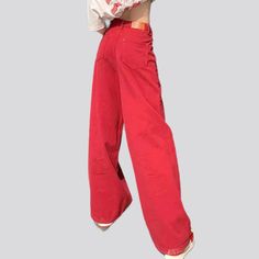 Be bold. and make an timeless impression with our 2023 Spring-Summer Collection red baggy jeans for women! A perfect blend of fashion y2k style with fashionable high-waist and bootcut fit. this exquisite piece is sure to make you the talk of the town!Why These Jeans Should Be Your Next PurchaseThese jeans are for the fashionistas who love to stand out from the crowd. From the bright red color to the intricate zippered and button closure. every feature has been patterned to perfection. Whether yo Red Wide Leg Pants With Pockets For Fall, Red Denim Bottoms For Fall, Trendy Baggy Flare Jeans For Summer, Trendy Summer Wide Leg Streetwear Pants, Baggy Trendy Flare Jeans For Summer, Cotton Wide Leg Pants For Streetwear, Trendy Wide Leg Pants With Pockets, Red Cotton Wide Leg Pants With Relaxed Fit, Trendy Wide Leg Pants For Streetwear