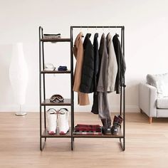 a rack with clothes and shoes on it