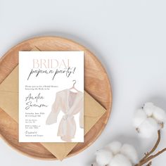 the bridal party is set up on top of a wooden plate next to cotton