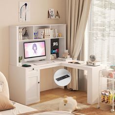 a white desk with a computer on top of it