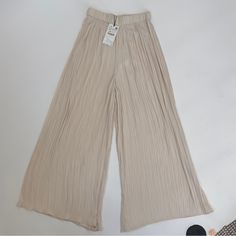 Condition: Excellent, New With Tags Size: S Color: Ivory / Champagne #Palazzo #Pleated #Trousers #Pants #Zara Chic Wide Leg Beige Bottoms, Chic Beige Wide Leg Bottoms, Beige Wide Leg Pants For Day Out, Chic Beige Wide Leg Pants For Day Out, Trendy Cream Wide Leg Pants, Off White Wide Leg Pants For Spring, Cream Straight Pants For Spring, Trendy Beige Wide Leg Pants For Spring, Cream Wide Leg Pants For Spring Day Out