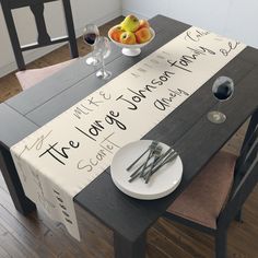 A dark wooden dining table with a cream-colored table runner personalized with various family names written in different styles. Personalized Table Runner, Cabinet Door Handles, Table Runner And Placemats, Family Moments, Personalized Wall Art, Linen Table Runner, Wooden Decor, Custom Table, Personalized Family