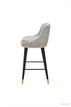 an upholstered bar stool with black legs and a white fabric seat, against a white background