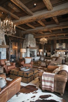 A stunning example of rustic elegance, this cabin combines a grand stone fireplace with cowhide rugs and rugged leather seating. Perfect for mountain retreats, this space redefines cozy luxury. Get inspired for your next cabin makeover. #RusticCabinStyle #CozyLuxuryInteriors #MountainLiving