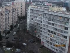 an aerial view of some buildings in the city