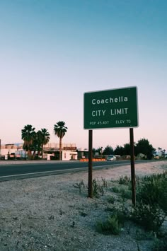 there is a sign that says coachella city limit on the side of the road