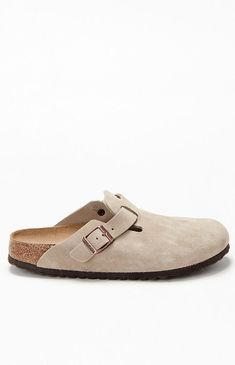 The Women's Taupe Boston Soft Footbed Clogs from Birkenstock are the most sought-after clog, adding a fashion-forward edge to any style. Crafted from velvety suede for timeless appeal, they feature an adjustable strap and a soft footbed with an additional foam layer for extra cushioning and all-day support.Suede leather upperCushioned soft footbedSuede footbed liningEVA soleFlexible and lightweightAdjustable strap with metal pin buckleMade in Germany quality stamp on footbed Birkenstock Womens W Birken Stock Clogs, Birkin Stocks Clogs, Birkin Stocks, Birkenstocks Clogs, Womens Birkenstocks, Boston Soft Footbed, Taupe Sandals, Birkenstock Clog, Birkenstock Clogs