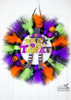 a wreath with halloween decorations on it