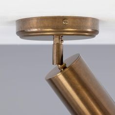 a close up of a light fixture on a ceiling