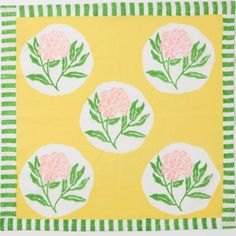 a yellow background with pink flowers and green leaves on the bottom, along with white circles