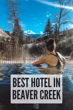 a woman in a hot tub with the words best hotel in beaver creek