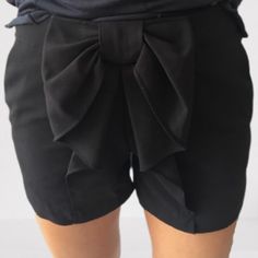 Dressy Black Shorts With Large Bow Detail By Ark & Co. Pair These Bottoms With A Tight-Fitting Tank & Some Strappy-Heeled Sandals For A Summer Night Out On The Town. Midrise, Dramatic Bow Accent Detail On The Front, Two Front Slant Pockets, Two Rear Welt Pockets, Side Zip, Mid-Rise 95% Polyester, 5% Spandex Black Size S Approx Flat 3.5" Inseam, 10" Rise, 13" Waist New With Tags, Smoke-Free Home When The Occasion Calls For A More Polished Summer Shorts Fit, You'll Love These Fun Ark & Co. Black B Spring Party Bottoms With Bow Detail, Spring Party Bottoms With Bow, Spring Fitted Bottoms With Bow Detail, Spring Fitted Bottoms With Bow, Fitted Spring Bottoms With Bow Detail, Chic Summer Bottoms With Bow Detail, Chic Spring Bottoms With Bow, Casual Fitted Shorts For Party, Fitted Black Shorts For Spring