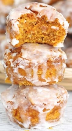 three glazed donuts stacked on top of each other