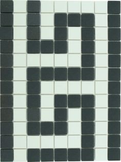 a black and white tiled wall with squares