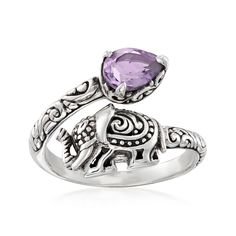 Ross-Simons - 1.00ct Amethyst Bali-Style Elephant Bypass Ring Pear Cut in Silver. Size 9. Rich with symbolism and beautifully designed, this Bali-style bypass ring is crafted in oxidized and polished sterling silver. It features a detailed elephant, a symbol of wisdom and good fortune, alongside a 1.00 carat pear-shaped amethyst, believed to bring tranquility to the wearer. 5/8" wide. Amethyst Bali-style elephant bypass ring. Amethyst birthstones are the perfect gift for February birthdays. Amethyst Birthstone, Symbol Of Wisdom, February Birthday, Bali Fashion, Bypass Ring, Pear Cut, Good Fortune, Buy 1, Pear Shaped