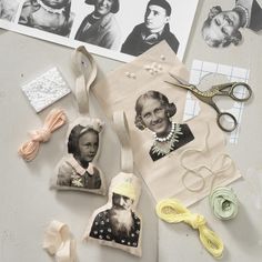 an assortment of crafting supplies including fabric, scissors and pictures