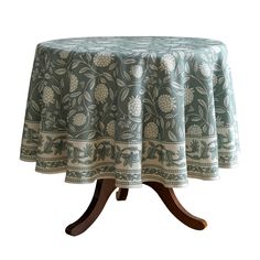 a round table with a blue and white floral design on it