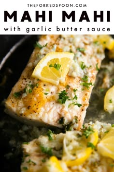 fish with garlic butter sauce and lemons on the side in a skillet that says, mahi mahi