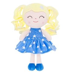 a stuffed doll with blonde hair and blue dress