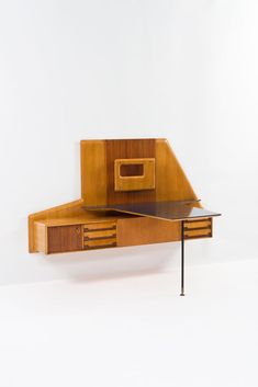 two wooden desks with drawers on each side and a metal table top in the middle