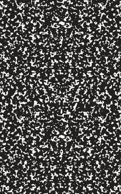 an abstract black and white background with lots of small speckles on the surface