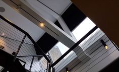 an escalator and railing in a building