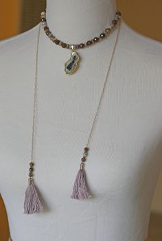 A boho wrap necklace stunner with a sparkly occo agate geode and lots of crystals in the center. The gemstones in the wrap necklace are natural faceted Peitersite in rich tones of brown, copper and caramel paired with Lepidolite in cool shades of dusty lavender. The lavender Lepidolite brings out the the subtle purple undertones in the Peitersite creating a unique statement for your boho chic look. This wrap necklace is a faux wrap, meaning it does have a clasp in the back to keep the necklace i Bohemian Crystal Necklaces With Natural Stones For Layering, Bohemian Gemstone Crystal Necklaces For Layering, Bohemian Agate Jewelry With Gemstone Accents, Bohemian Gemstone Crystal Necklace For Layering, Bohemian Agate Necklace With Gemstone Accents, Bohemian Geodes For Healing With Natural Stones, Bohemian Geodes For Healing, Bohemian Natural Stone Geodes For Healing, Bohemian Hand Knotted Agate Jewelry