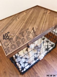 a wooden crate with the words crate topper on it sitting on a hard wood floor