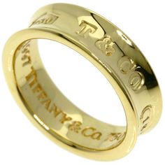 Used Tiffany 1837 Ring, 18k Yellow Gold, Women's, Tiffany&Co. (Sku: Gzl139em) === General === Brand : Tiffany === Design === Type : Band Ring Gender : Women Material : Yellow Gold (18k) === Size === Other Size : 5.9 === Included Items === Accessories : None Accessories Notice : Before Purchasing, Please Refer To The Images Of The Accessories Included With The Item. === Condition === Condition : Used (Very Good) Ranking : Rank A Used - A Few Traces Of Usage, Some Scratches / Dirt Can Be Seen But Jewelry Tiffany, Tiffany Jewelry, Tiffany & Co., Band Ring, Luxury Branding, Band Rings, Yellow Gold, Women Jewelry, Band