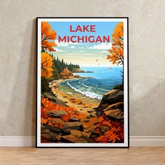 a lake michigan poster hanging on the wall