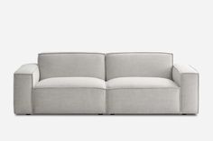 a gray and white couch on a white background