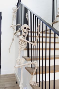 a skeleton is walking down the stairs