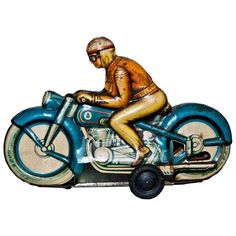 a man riding on the back of a blue motorcycle