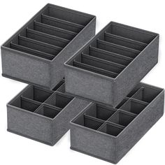 six grey storage bins with dividers on each side