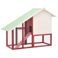 a red and white chicken coop with a green roof