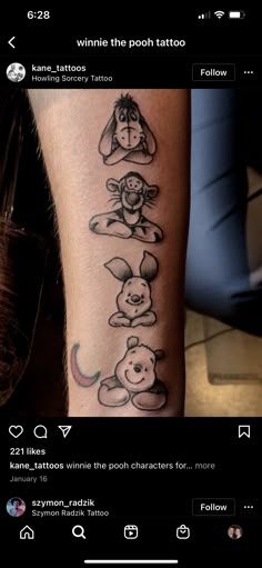 a tattoo with winnie the pooh, eeo and pluto on it's arm