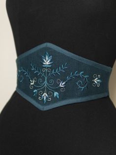 "The Elvish Garden" Do you like corsets but also like to feel comfortable in your clothes? This belt is made for you! This is an embroidered elastic waist cincher, made of quality linen. Steel bones on the front of the belt provide support and give the illusion that it is a real corset. The sturdy elastic that makes up the back of this accessory allows for greater support than a classic belt and will adapt perfectly to your waist. The embroidered pattern was created in our workshop for this uniq Corset Belt Pattern, Linen Corset, Cincher Belt, Classic Belt, Diy Clothes Design, Corset Belt, Embroidered Linen, Corset Lingerie, Waist Cincher