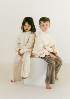 Fostered Collection features minimal kids clothes designed to last. Discover timeless kids outfits in neutral tones that blend effortlessly into any child's wardrobe. Our practical and sustainable kids clothes feature cotton basics for kids and neutral colors, so your family can shop for their whole minimal kids wardrobe in one place! Shop the new Fostered Collection kids clothing collection online now! Fostered Collection, Uniqlo Kids, Mises En Page Design Graphique, Kids Wardrobe, Winter Kids, Kids Branding, Family Photoshoot, Yearbook, Neutral Tones